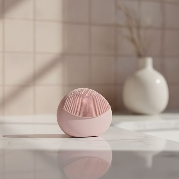 An electric facial cleansing brush