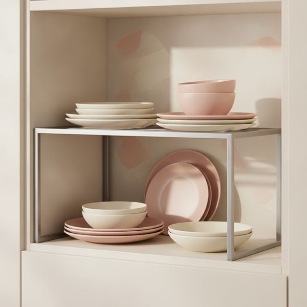 Adjustable shelf risers and stackable shelves